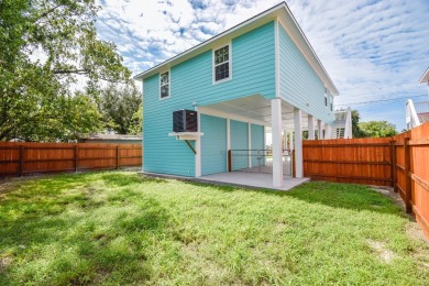 The home is elevated on pilings to allow for covered parking and on Rockport Country Club in Texas - for sale on GolfHomes.com, golf home, golf lot