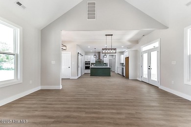 Welcome to easy, elegant living in this beautifully crafted new on Chowan Golf and Country Club in North Carolina - for sale on GolfHomes.com, golf home, golf lot