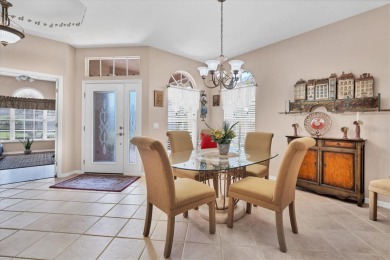 ENJOY THE CASUAL COASTAL LIFESTYLE YOU DESERVE IN PRIVATE, GATED on Pelican Pointe Golf and Country Club in Florida - for sale on GolfHomes.com, golf home, golf lot