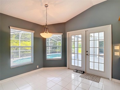 One or more photo(s) has been virtually staged. Nestled at the on Harbor Hills Country Club in Florida - for sale on GolfHomes.com, golf home, golf lot