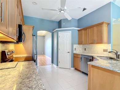 One or more photo(s) has been virtually staged. Nestled at the on Harbor Hills Country Club in Florida - for sale on GolfHomes.com, golf home, golf lot
