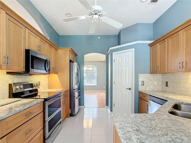 One or more photo(s) has been virtually staged. Nestled at the on Harbor Hills Country Club in Florida - for sale on GolfHomes.com, golf home, golf lot