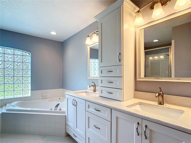 One or more photo(s) has been virtually staged. Nestled at the on Harbor Hills Country Club in Florida - for sale on GolfHomes.com, golf home, golf lot