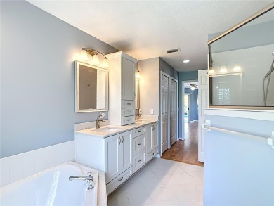 One or more photo(s) has been virtually staged. Nestled at the on Harbor Hills Country Club in Florida - for sale on GolfHomes.com, golf home, golf lot