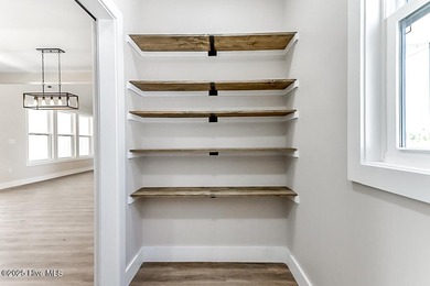 Welcome to easy, elegant living in this beautifully crafted new on Chowan Golf and Country Club in North Carolina - for sale on GolfHomes.com, golf home, golf lot