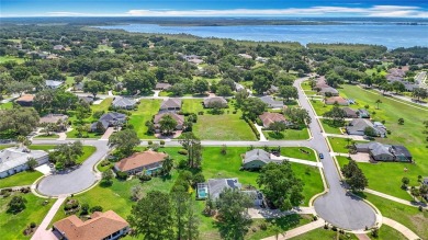 One or more photo(s) has been virtually staged. Nestled at the on Harbor Hills Country Club in Florida - for sale on GolfHomes.com, golf home, golf lot