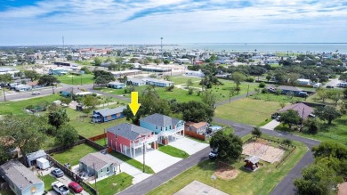 The home is elevated on pilings to allow for covered parking and on Rockport Country Club in Texas - for sale on GolfHomes.com, golf home, golf lot