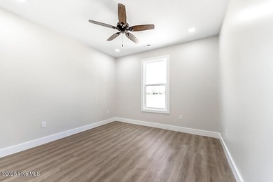 Welcome to easy, elegant living in this beautifully crafted new on Chowan Golf and Country Club in North Carolina - for sale on GolfHomes.com, golf home, golf lot