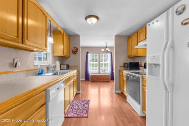 Beautifully Updated 3-Bedroom, 2-Bath Home with An EXTRA Lot on High Point Golf Club, Inc. in Florida - for sale on GolfHomes.com, golf home, golf lot