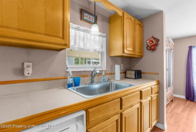 Beautifully Updated 3-Bedroom, 2-Bath Home with An EXTRA Lot on High Point Golf Club, Inc. in Florida - for sale on GolfHomes.com, golf home, golf lot