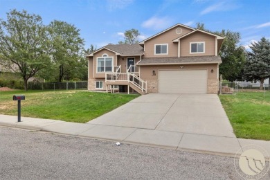 Welcome to this spacious and inviting 4 bed, 3 bath home filled on Lake Hills Golf Course in Montana - for sale on GolfHomes.com, golf home, golf lot