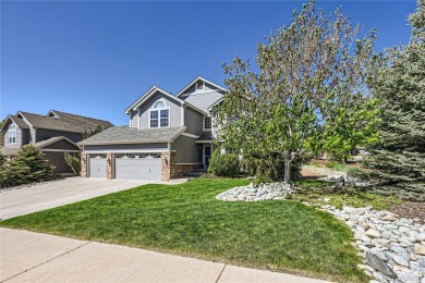 Nestled on a corner lot in a serene cul-de-sac within the on Red Hawk Ridge in Colorado - for sale on GolfHomes.com, golf home, golf lot