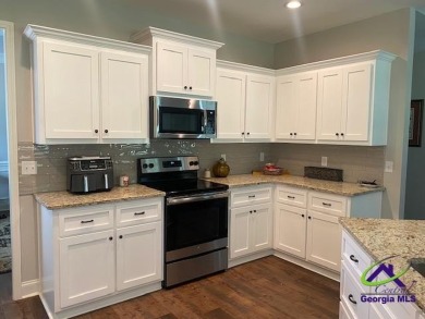 Spacious Home in a 55+ Active community in Perry GA.  2276 sq on Houston Springs Resort and Golf Course in Georgia - for sale on GolfHomes.com, golf home, golf lot