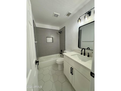 Explore this newly renovated beautiful 3-bedroom, 2-bathroom on The Foothills Golf Club in Arizona - for sale on GolfHomes.com, golf home, golf lot