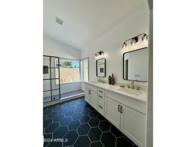 Explore this newly renovated beautiful 3-bedroom, 2-bathroom on The Foothills Golf Club in Arizona - for sale on GolfHomes.com, golf home, golf lot