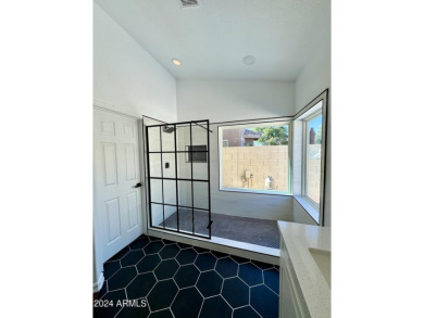 Explore this newly renovated beautiful 3-bedroom, 2-bathroom on The Foothills Golf Club in Arizona - for sale on GolfHomes.com, golf home, golf lot