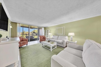 Enjoy serene northerly golf course views from your private oasis on Palm-Aire Country Club and Resort - Palms in Florida - for sale on GolfHomes.com, golf home, golf lot