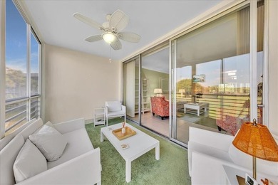 Enjoy serene northerly golf course views from your private oasis on Palm-Aire Country Club and Resort - Palms in Florida - for sale on GolfHomes.com, golf home, golf lot