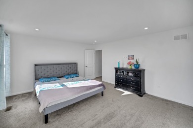 PREMIUM LOT | CONTINENTAL PLAN | SUN ROOM EXTENSION | POND VIEWS on Boulder Ridge Country Club in Illinois - for sale on GolfHomes.com, golf home, golf lot