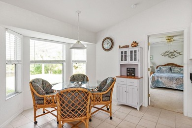 Situated in the desirable Gardens of Gulf Cove, this CANAL-FRONT on Duffys Golf Center in Florida - for sale on GolfHomes.com, golf home, golf lot