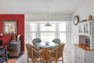 Situated in the desirable Gardens of Gulf Cove, this CANAL-FRONT on Duffys Golf Center in Florida - for sale on GolfHomes.com, golf home, golf lot