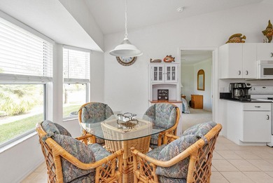 Situated in the desirable Gardens of Gulf Cove, this CANAL-FRONT on Duffys Golf Center in Florida - for sale on GolfHomes.com, golf home, golf lot