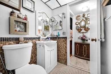 Welcome to this unique 2-bedroom, 2-bathroom corner unit on the on Sunrise Lakes Phase IV Golf Course in Florida - for sale on GolfHomes.com, golf home, golf lot