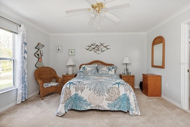 Situated in the desirable Gardens of Gulf Cove, this CANAL-FRONT on Duffys Golf Center in Florida - for sale on GolfHomes.com, golf home, golf lot