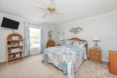 Situated in the desirable Gardens of Gulf Cove, this CANAL-FRONT on Duffys Golf Center in Florida - for sale on GolfHomes.com, golf home, golf lot