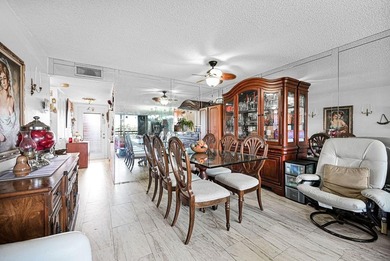 Welcome to this unique 2-bedroom, 2-bathroom corner unit on the on Sunrise Lakes Phase IV Golf Course in Florida - for sale on GolfHomes.com, golf home, golf lot