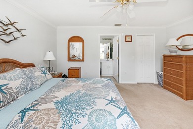 Situated in the desirable Gardens of Gulf Cove, this CANAL-FRONT on Duffys Golf Center in Florida - for sale on GolfHomes.com, golf home, golf lot