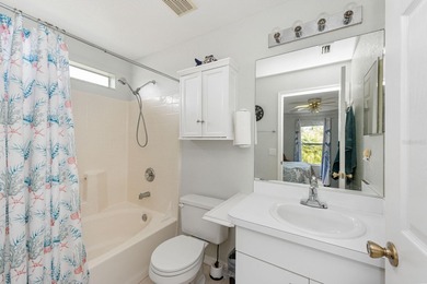 Situated in the desirable Gardens of Gulf Cove, this CANAL-FRONT on Duffys Golf Center in Florida - for sale on GolfHomes.com, golf home, golf lot