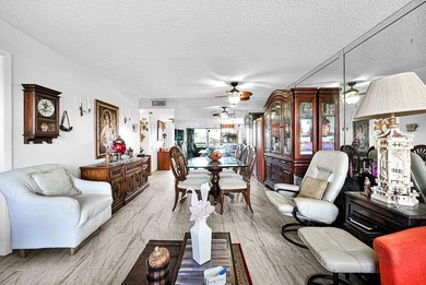 Welcome to this unique 2-bedroom, 2-bathroom corner unit on the on Sunrise Lakes Phase IV Golf Course in Florida - for sale on GolfHomes.com, golf home, golf lot