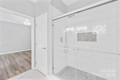 Experience refined living in this beautifully updated, move-in on Skybrook Golf Club in North Carolina - for sale on GolfHomes.com, golf home, golf lot