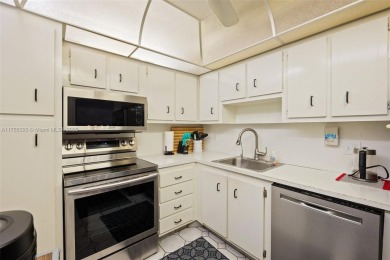 Welcome to this freshly painted, move-in ready 2-bedroom on Pembroke Lakes Golf Club in Florida - for sale on GolfHomes.com, golf home, golf lot