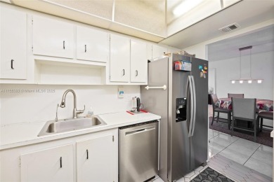 Welcome to this freshly painted, move-in ready 2-bedroom on Pembroke Lakes Golf Club in Florida - for sale on GolfHomes.com, golf home, golf lot