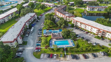 Located directly across from the pool. Six-unit building - small on Hollybrook Golf and Tennis Club  in Florida - for sale on GolfHomes.com, golf home, golf lot