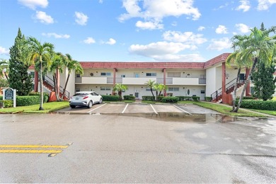 Located directly across from the pool. Six-unit building - small on Hollybrook Golf and Tennis Club  in Florida - for sale on GolfHomes.com, golf home, golf lot
