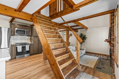 Tucked into a prime hillside setting within Hide-A-Way Hills on Hide-A-Way Hills Golf Club in Ohio - for sale on GolfHomes.com, golf home, golf lot