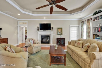 This home has it all! Curb appeal, low maintenance, attention to on Cape Fear National At Brunswick Forest in North Carolina - for sale on GolfHomes.com, golf home, golf lot