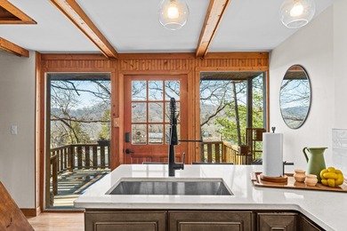 Tucked into a prime hillside setting within Hide-A-Way Hills on Hide-A-Way Hills Golf Club in Ohio - for sale on GolfHomes.com, golf home, golf lot