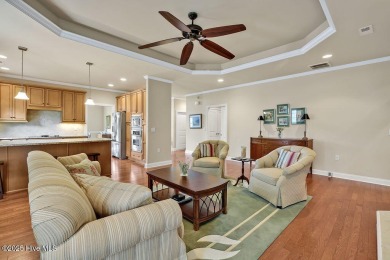 This home has it all! Curb appeal, low maintenance, attention to on Cape Fear National At Brunswick Forest in North Carolina - for sale on GolfHomes.com, golf home, golf lot