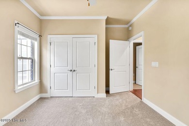 This home has it all! Curb appeal, low maintenance, attention to on Cape Fear National At Brunswick Forest in North Carolina - for sale on GolfHomes.com, golf home, golf lot