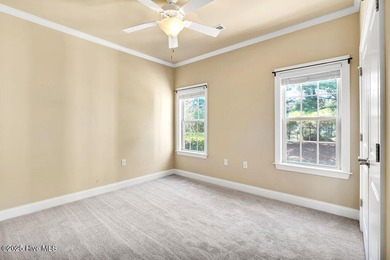 This home has it all! Curb appeal, low maintenance, attention to on Cape Fear National At Brunswick Forest in North Carolina - for sale on GolfHomes.com, golf home, golf lot