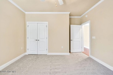 This home has it all! Curb appeal, low maintenance, attention to on Cape Fear National At Brunswick Forest in North Carolina - for sale on GolfHomes.com, golf home, golf lot