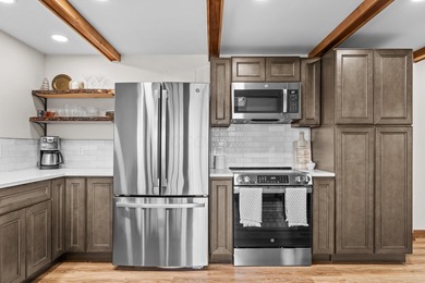 Tucked into a prime hillside setting within Hide-A-Way Hills on Hide-A-Way Hills Golf Club in Ohio - for sale on GolfHomes.com, golf home, golf lot