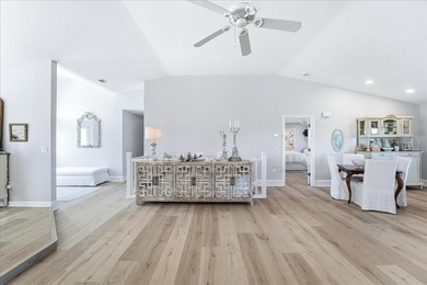 Move-in ready coastal home with extensive high-value upgrades on Rotonda Golf and Country Club The Links Course in Florida - for sale on GolfHomes.com, golf home, golf lot