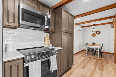 Tucked into a prime hillside setting within Hide-A-Way Hills on Hide-A-Way Hills Golf Club in Ohio - for sale on GolfHomes.com, golf home, golf lot