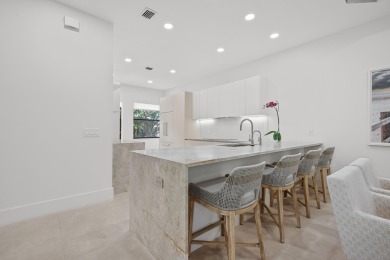 Modern refinement meets elegance in this exceptionally renovated on Boca Delray Golf and Country Club in Florida - for sale on GolfHomes.com, golf home, golf lot