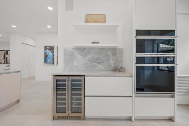 Modern refinement meets elegance in this exceptionally renovated on Boca Delray Golf and Country Club in Florida - for sale on GolfHomes.com, golf home, golf lot